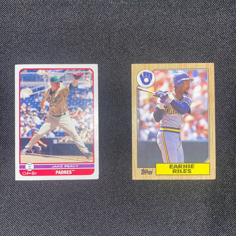 Set of 2 baseball cards. Jake Peavy w/the Padres & Earnie Riles w/the Brewers